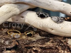 Kolczyk kółko clicker złoty z czarnymi cyrkoniami - K-012