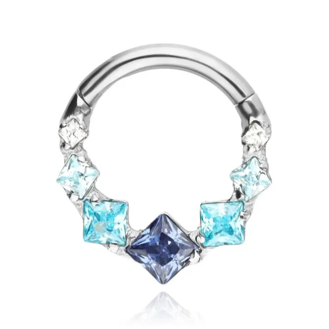 Tytanowy kolczyk clicker z niebieskimi cyrkoniami - srebrny - TK-099