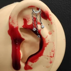 Tytanowy kolczyk labret księżyc z cyrkoniami - złoty - TGW-160