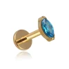 Tytanowy kolczyk labret złoty łezka z niebieską cyrkonią
