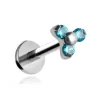 Tytanowy kolczyk labret z trzema niebieskimi cyrkoniami