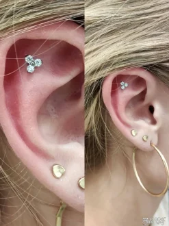 Tytanowy kolczyk labret z trzema niebieskimi cyrkoniami